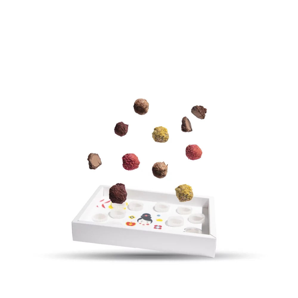 Kutija sa deset Aguara čokoladnih tartufa sa pastom od pistaća, lešnika, oraha i badema, ručno rađenih i upakovanih u jedinstveno dizajniranu kutiju posvećenu ženama.