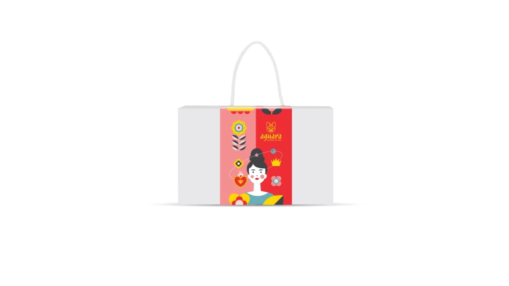 Aguara poklon pakovanje sa drškom za Osmi mart. Na pakovanju se nalazi ilustracija ćene inspirisane Fridom Kalo.