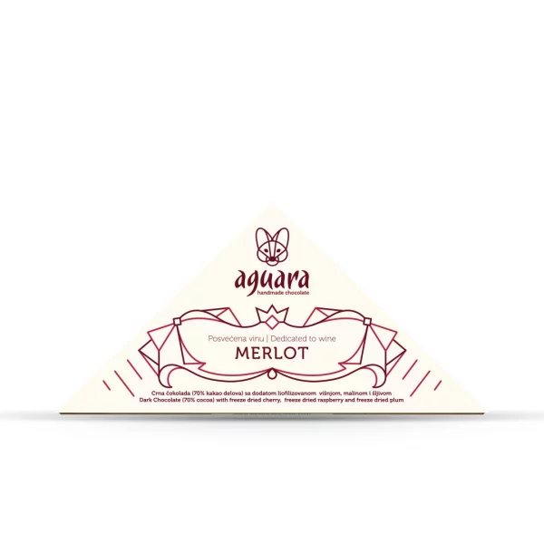 Trouglasta čokolada čokoladeposvećene vinu Merlo. Na ambalaži se nalaze linijski elementi koji predstavljaju elemente srpske tradicije.